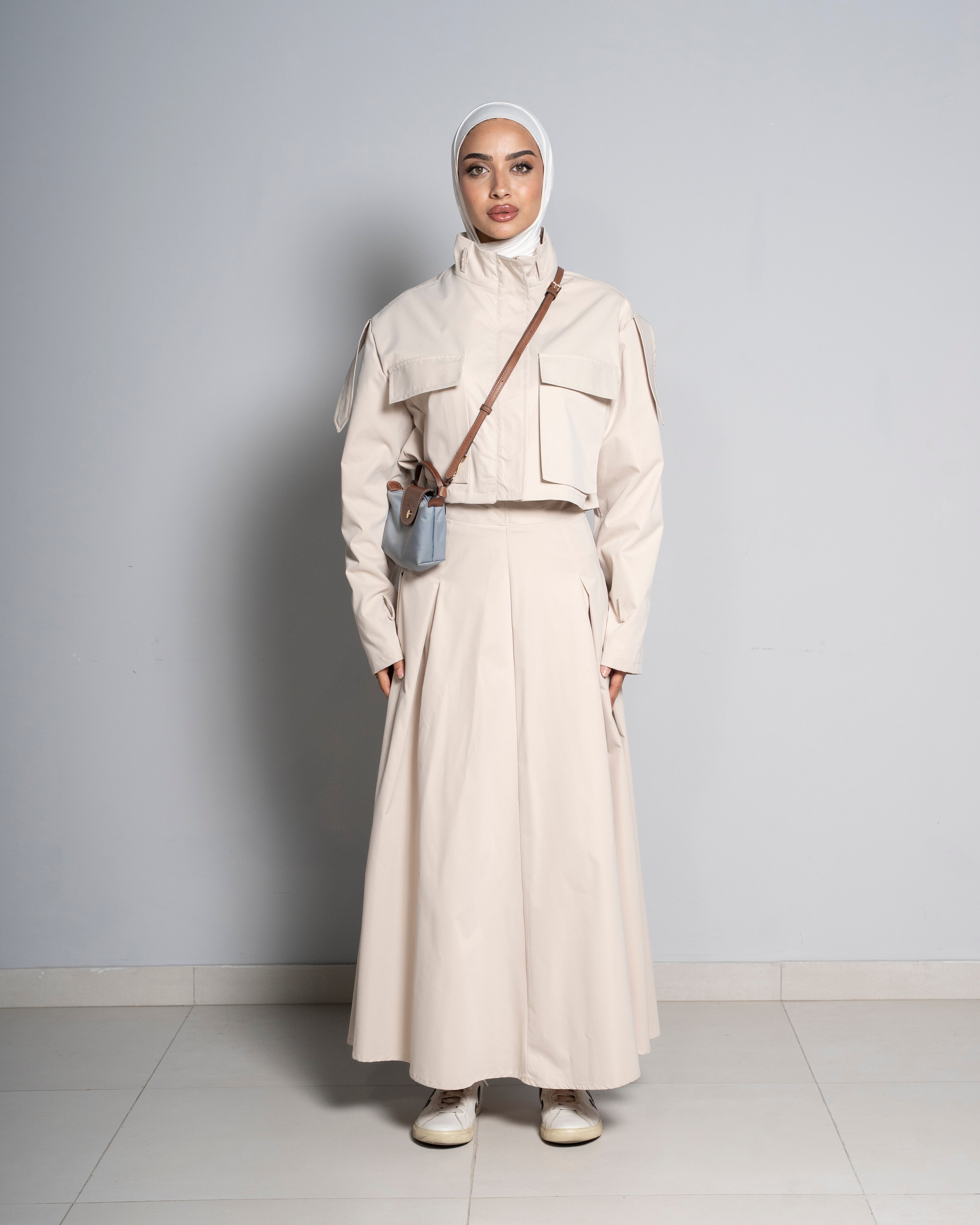 Beige Cropped Jacket Paired with Matching Skirt