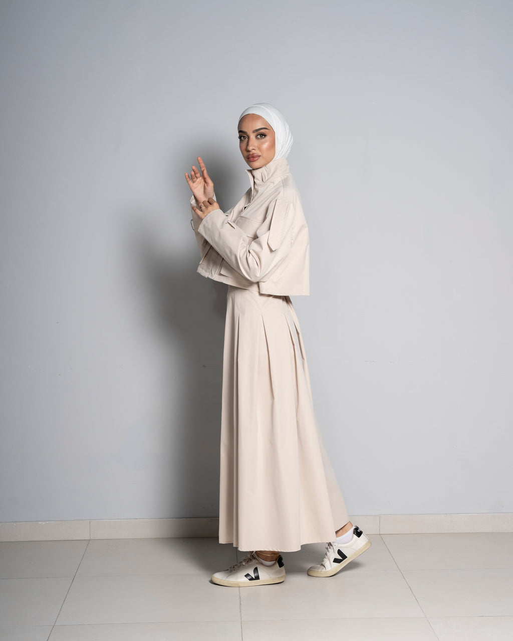 Beige Cropped Jacket Paired with Matching Skirt