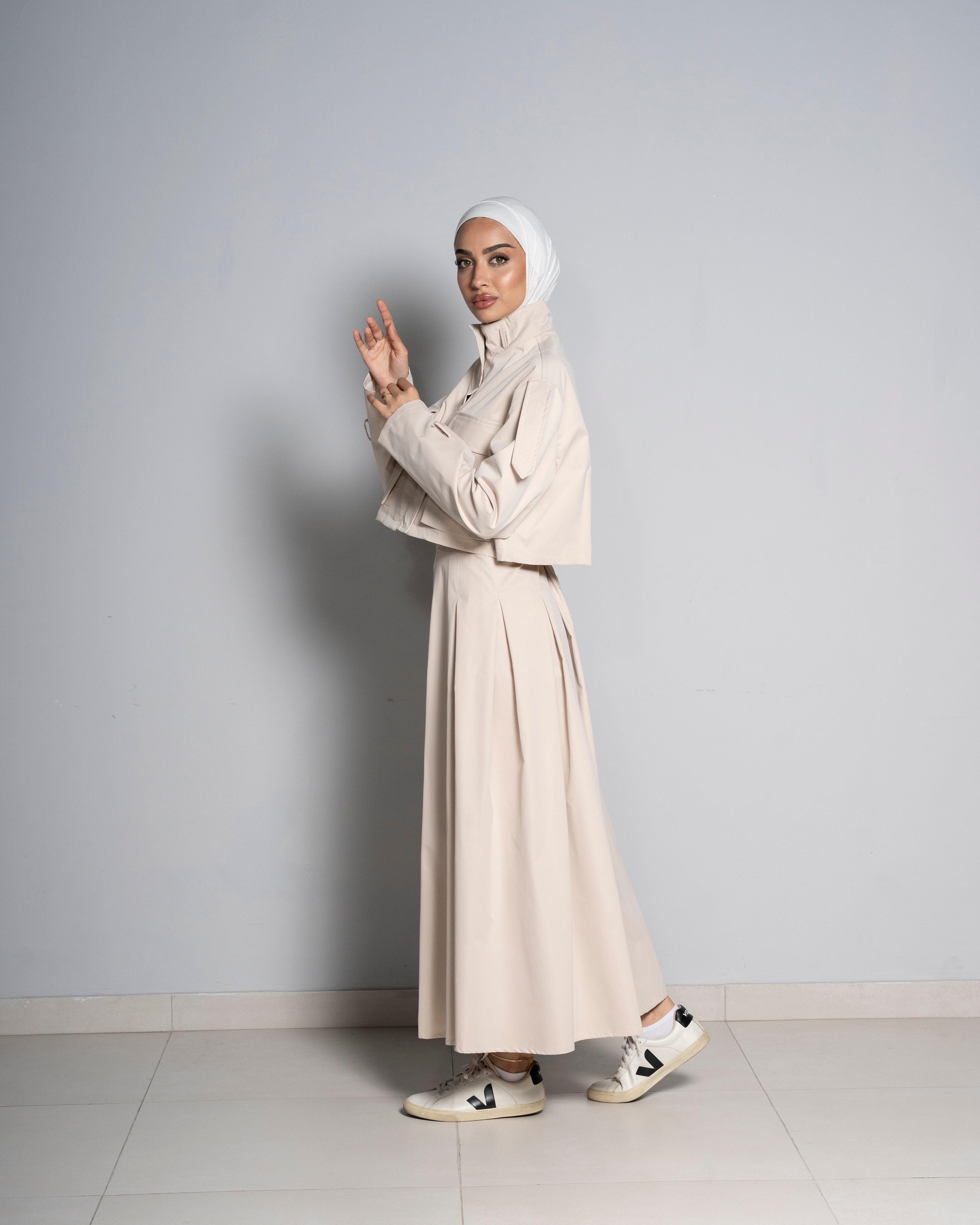 Beige Cropped Jacket Paired with Matching Skirt